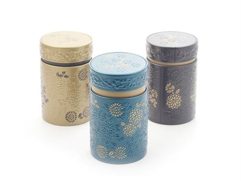 Luxe theeblikjes met bloemendesign, perfect voor theebewaring